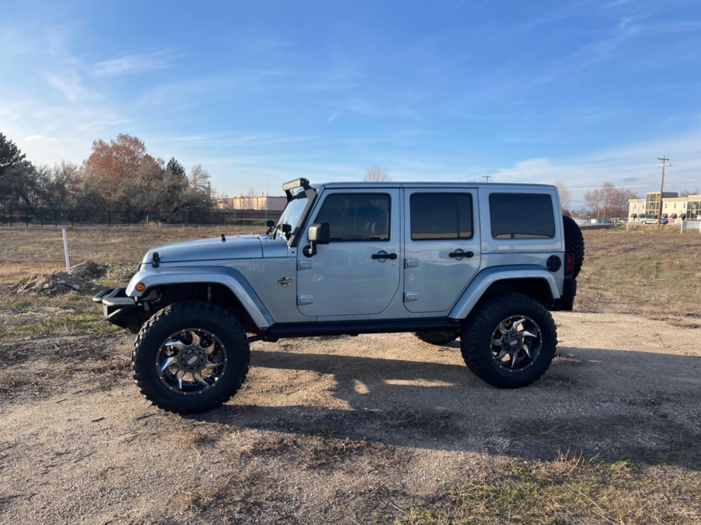 2012 Blue /Black Jeep Wrangler Artic (1C4HJWEG2CL) with an 3.6 V6 engine, AT transmission, located at 813 E Fairview Ave, Meridian , ID, 83642, (208) 336-8230, 43.618851, -116.384010 - Photo#0